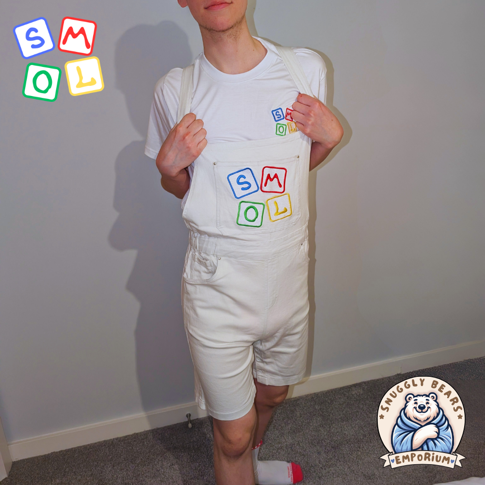 Person wearing SMOL shortalls and matching tee, showcasing a playful and cute style from Snuggly Bears Emporium.