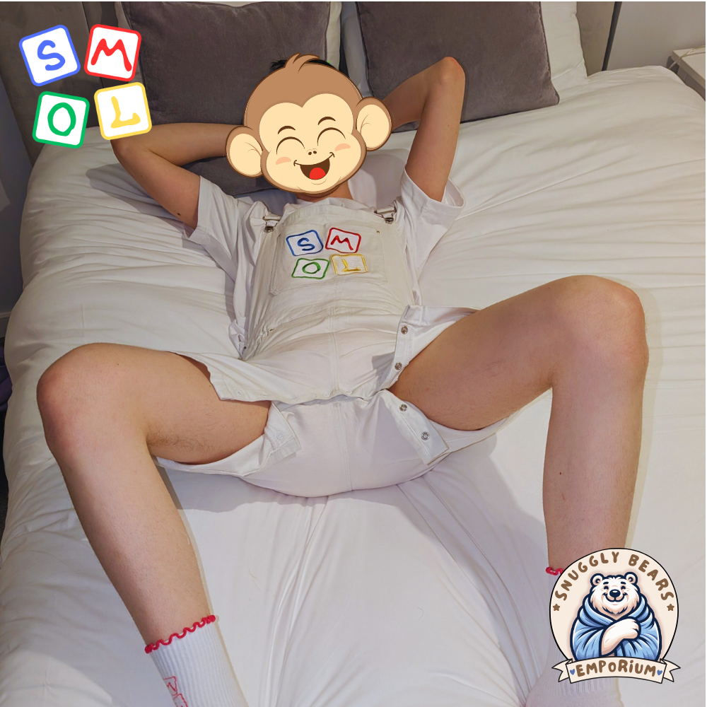 Person wearing SMOL shortalls and matching tee, showcasing a playful and cute style from Snuggly Bears Emporium.