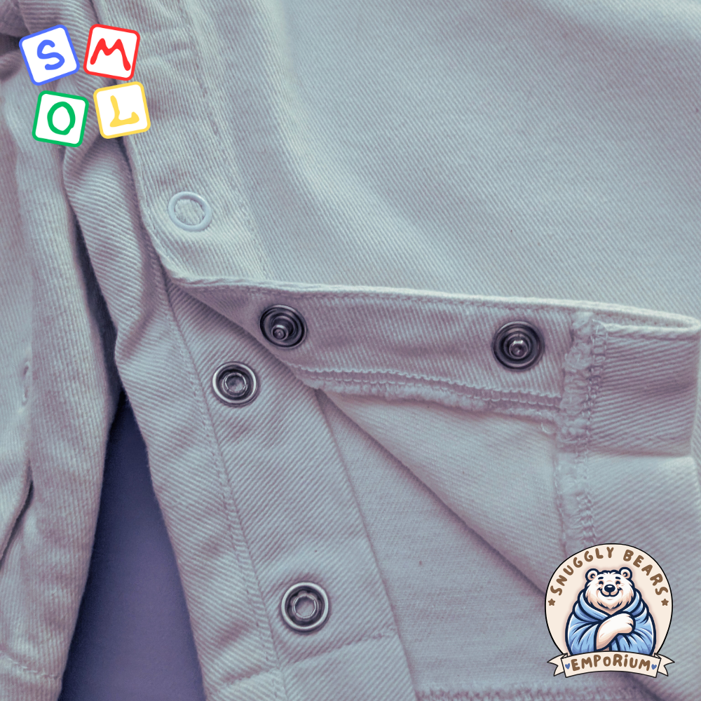 Person wearing SMOL shortalls and matching tee, showcasing a playful and cute style from Snuggly Bears Emporium.
