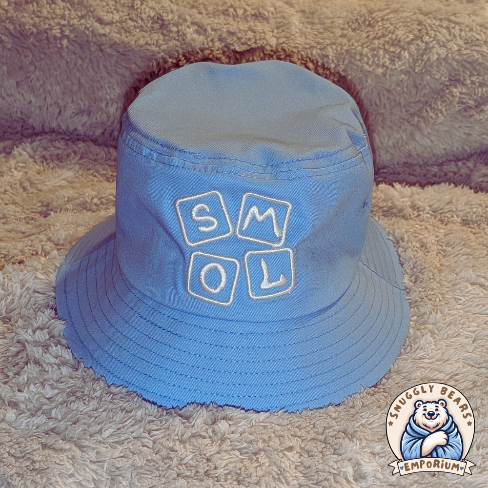 Blue SMOL bucket hat with white block letters, perfect for sunny outdoor playdates and stylish everyday wear.