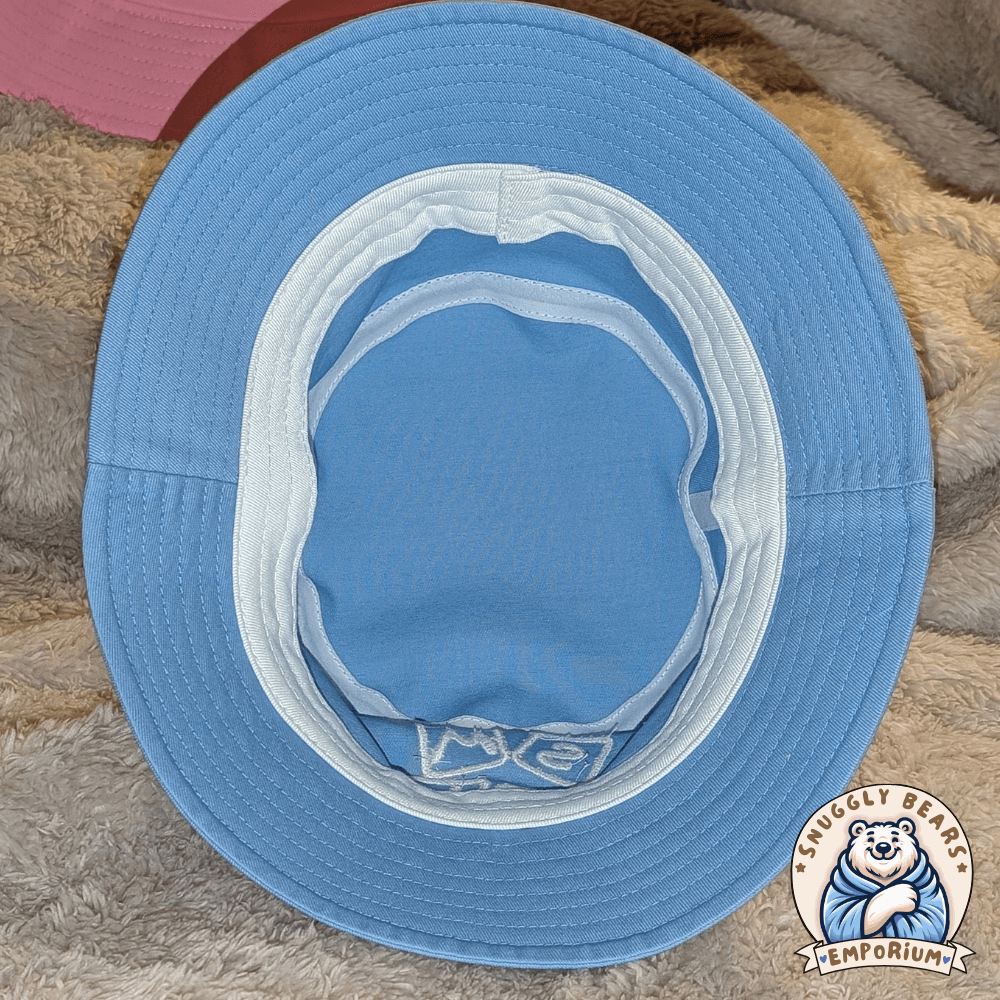 Inside lined hem of the SMOL buck hats