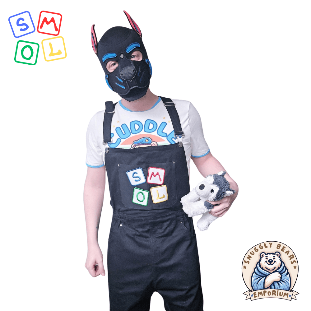 Person wearing SMOL shortalls and matching tee, showcasing a playful and cute style from Snuggly Bears Emporium.