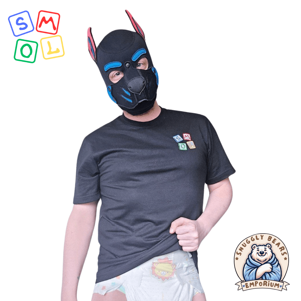 Puppy wearing a black SMOL branded t-shirt