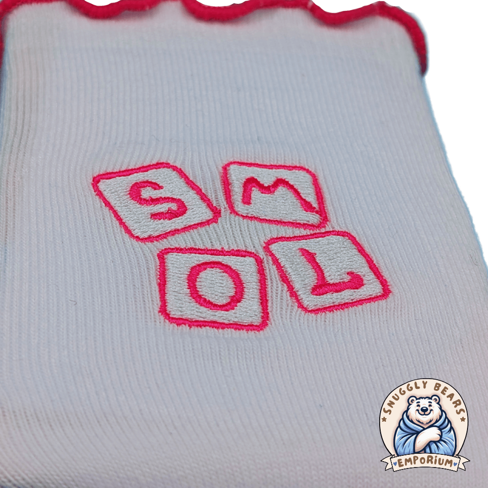 SMOL Little Girl ABDL Socks with pink accents, ruffled edges, and playful lettering for a cute and comfy look.
