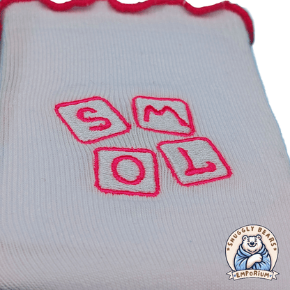 SMOL Little Girl ABDL Socks with pink accents, ruffled edges, and playful lettering for a cute and comfy look.